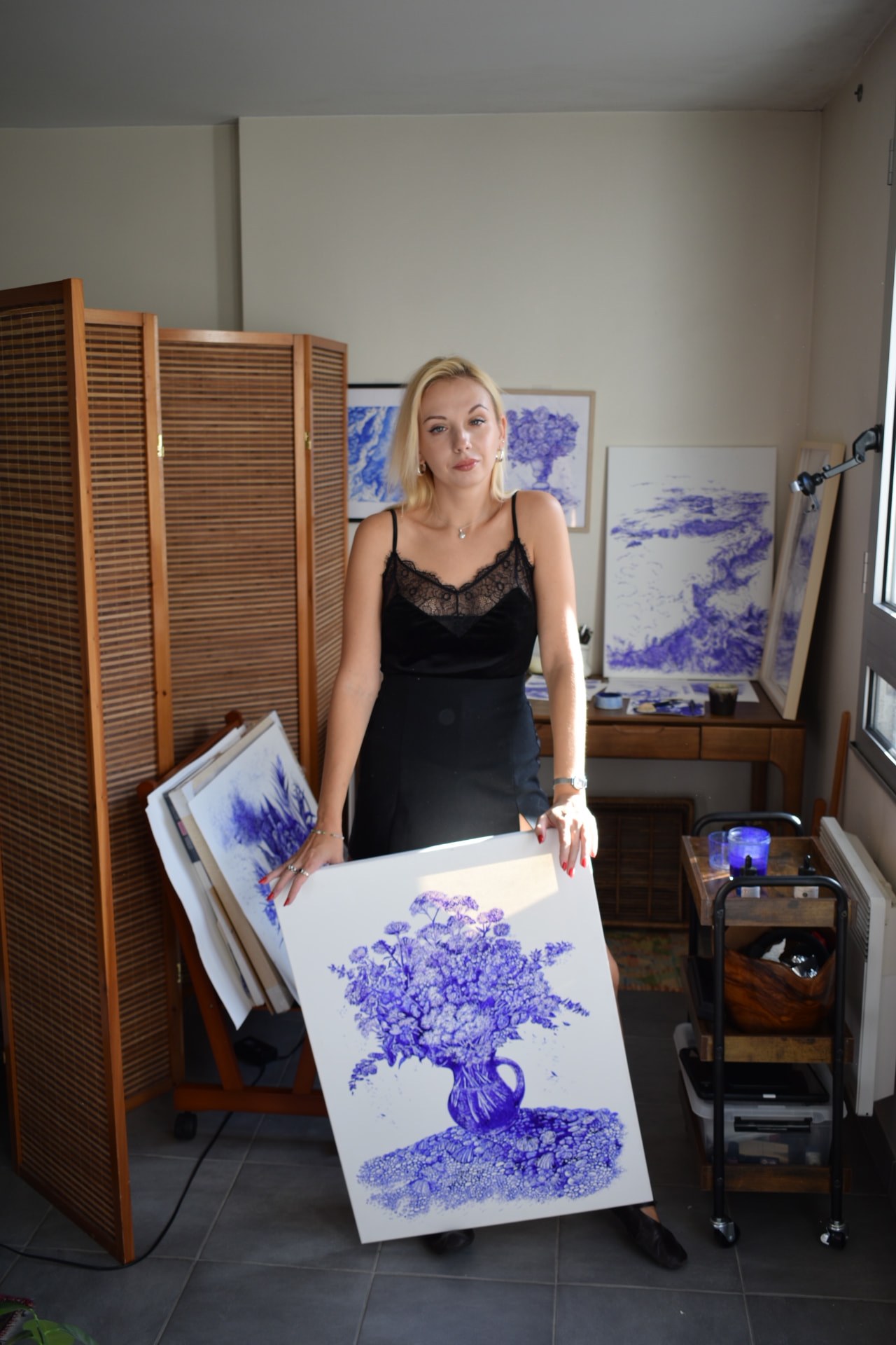Marta Valkiv with one of her works
